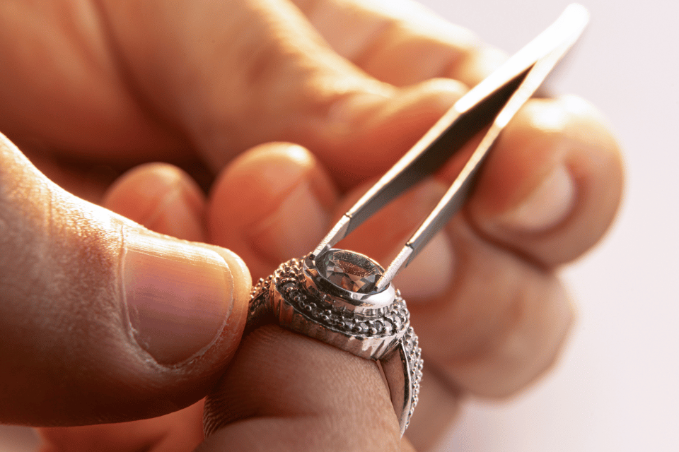 Custom Jewelers in Cincinnati - setting a gemstone in a custom ring