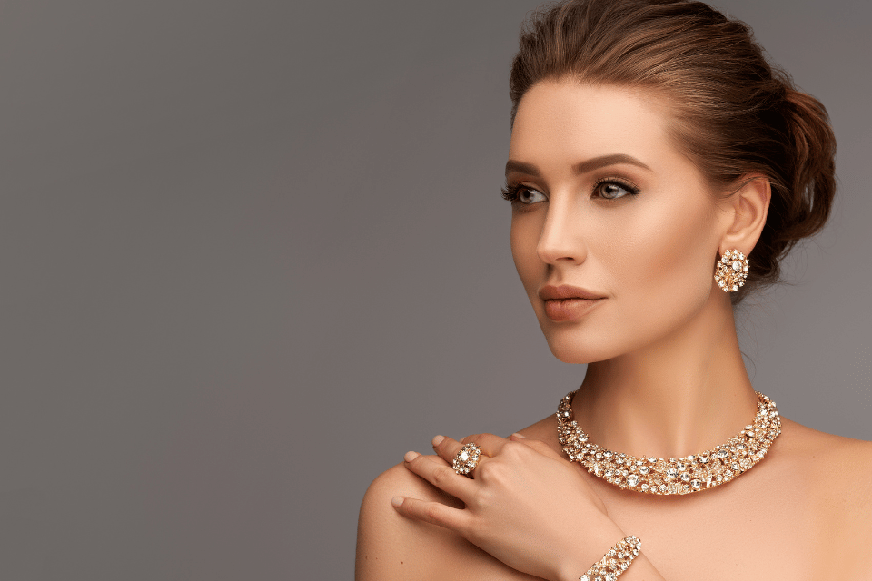 Custom Jewelry Design Centerville, Ohio - a woman wearing a suite of diamond and gold jewelry