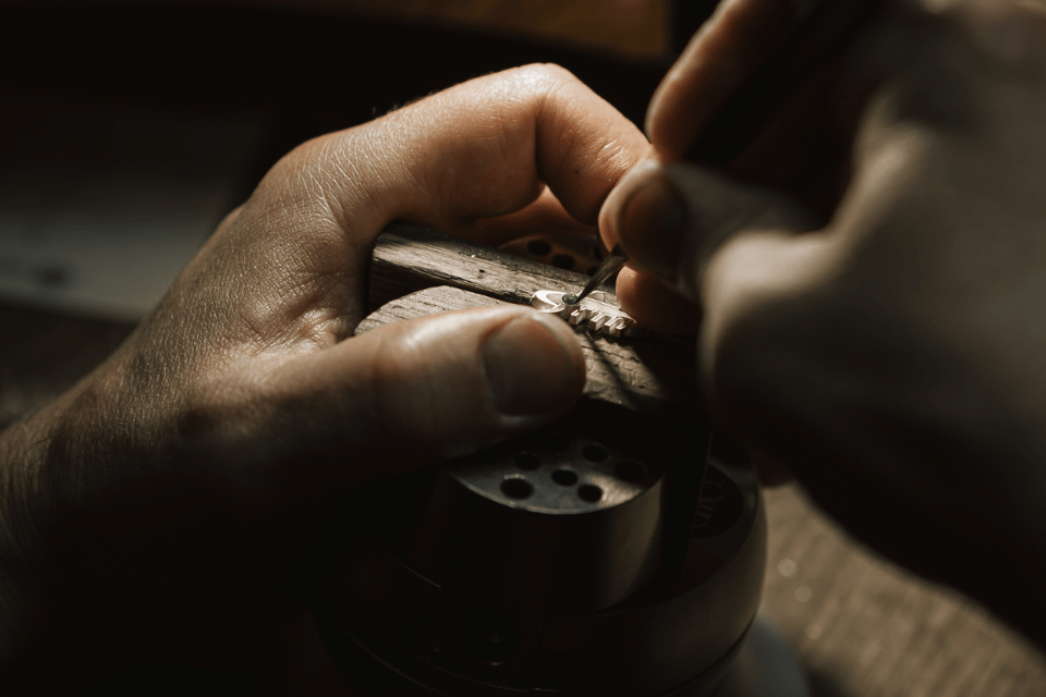 Custom jewelry in Dayton, Ohio - setting a gem in a custom piece
