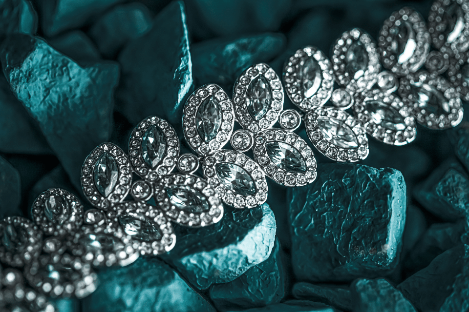 Diamond Repair Services in Dayton, Ohio - diamond bracelet on aqua green pebbles
