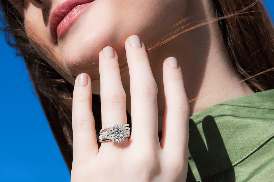 Fana engagement ring Dayton Ohio - woman wearing a diamond ring with platinum band and diamond band