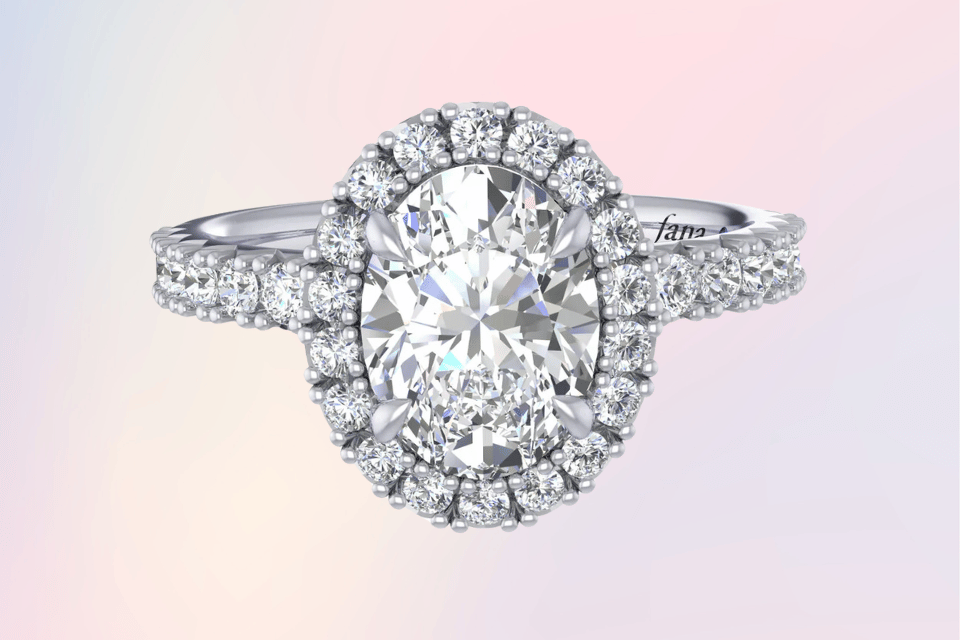 Fana Engagement Ring Dayton Ohio - Oval Cut setting surrounded by diamonds and a diamond band in a platinum ring.