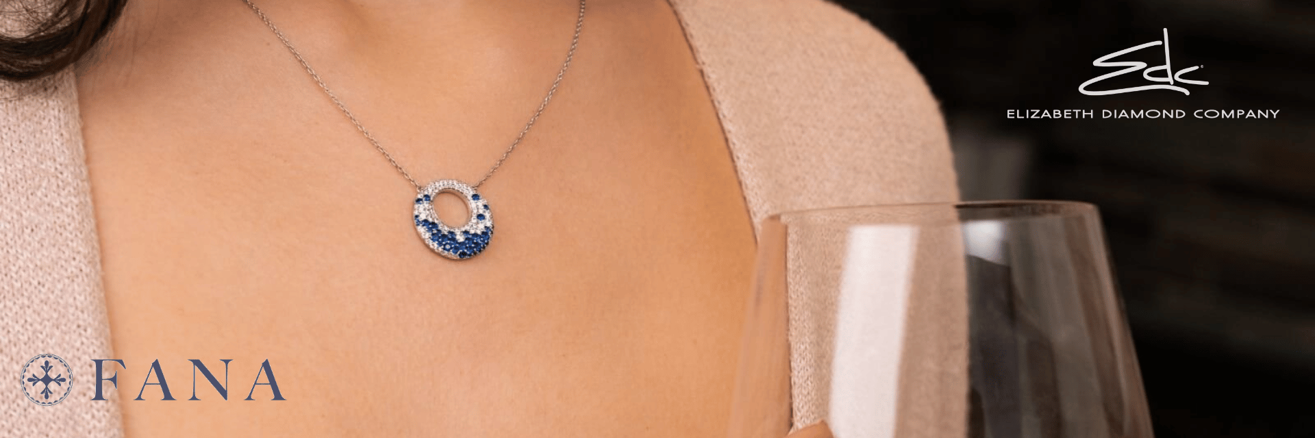 BluFana jewelry Dayton, Ohio - woman wearing diamond and sapphire Fana pendant necklacee Royale Dayton, OH