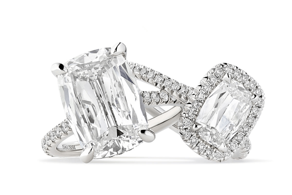 Henri Daussi Cincinnati, OH - diamond rings on white background