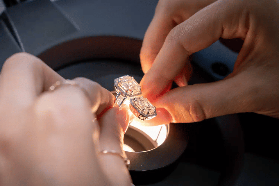 Lab Diamonds for Sale Near Me Dayton, Ohio - crafter comparing lab-grown diamond rings in the light