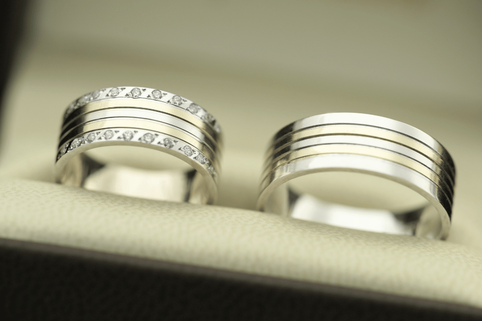 Men's and Ladies Matching Wedding Bands in Dayton, Ohio - ladies wedding band in white gold and yellow gold with diamonds, mens wedding band in white and yellow gold