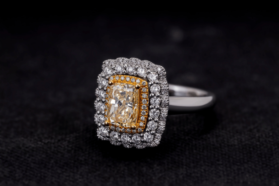 Ohio Diamonds - cushion-cut diamond ring with yellow diamond center and diamonds encircling