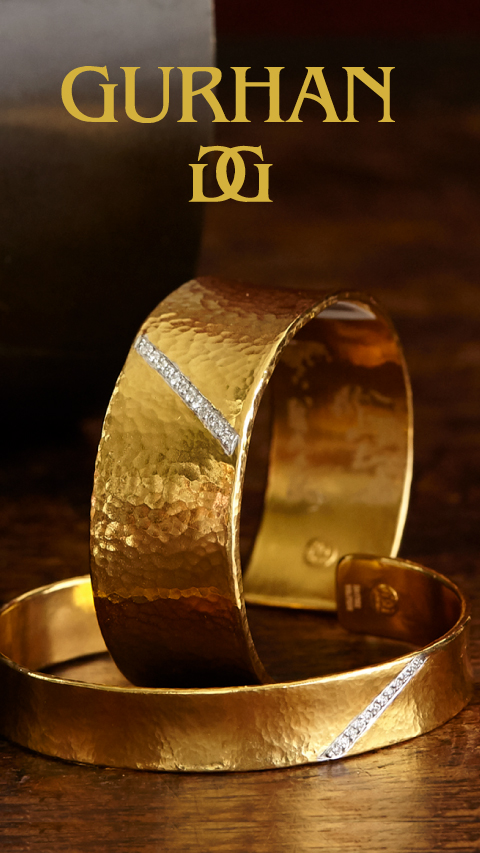 Golden Gurhan Ring and Bangles on a dark gold background